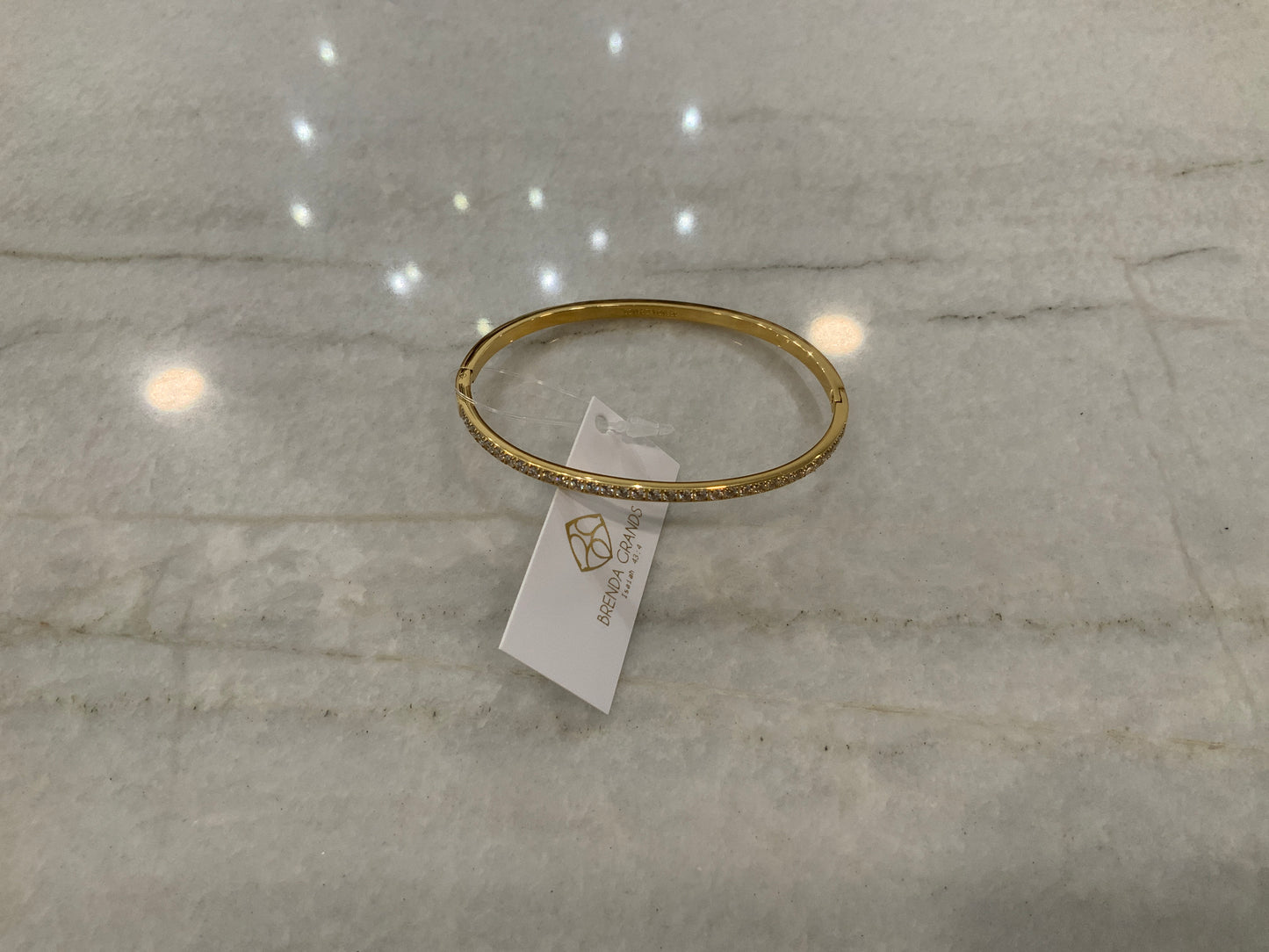 Gold lined diamond bangle bracelet