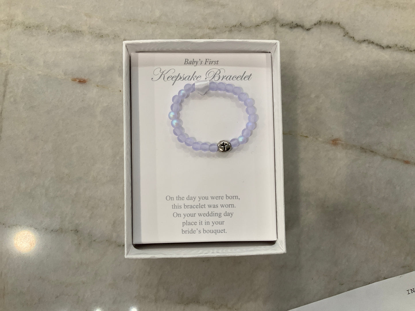 Blue baby’s first bracelet w/ cross