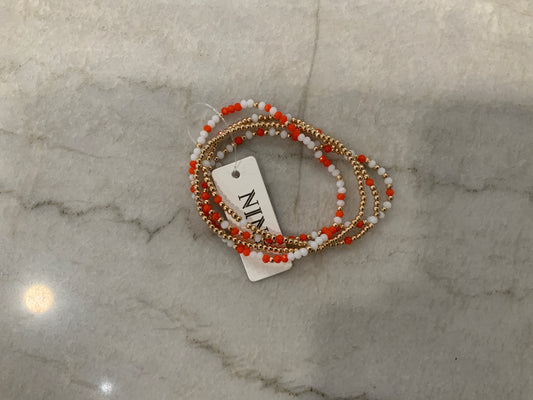 Orange and White beaded brackets