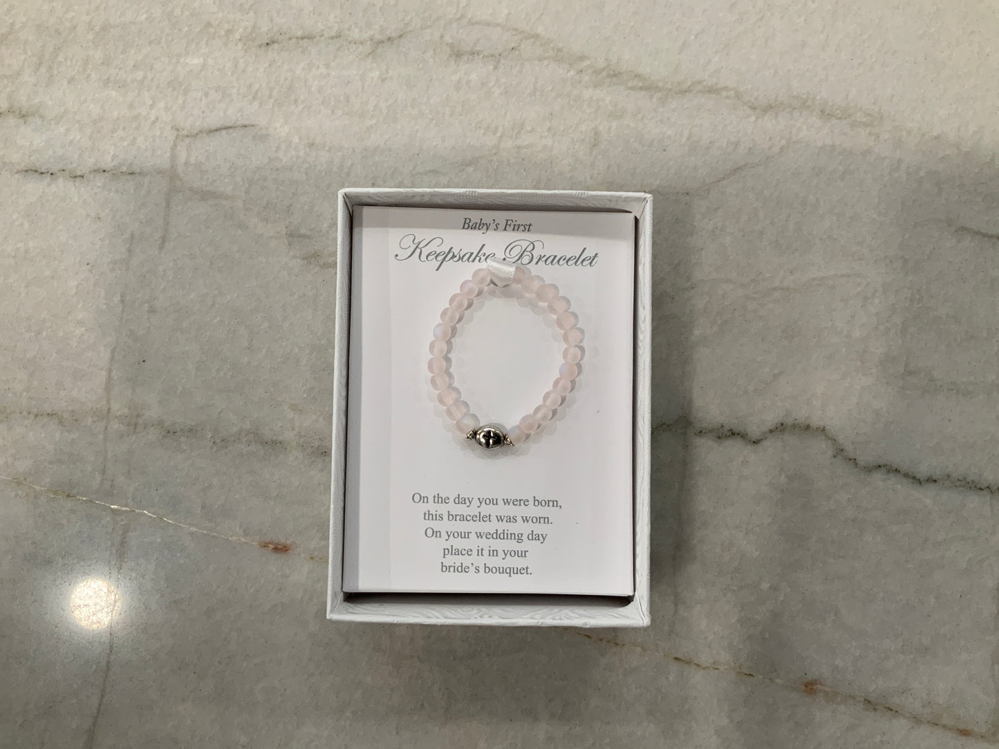 Pink Baby’s first bracelet w/cross