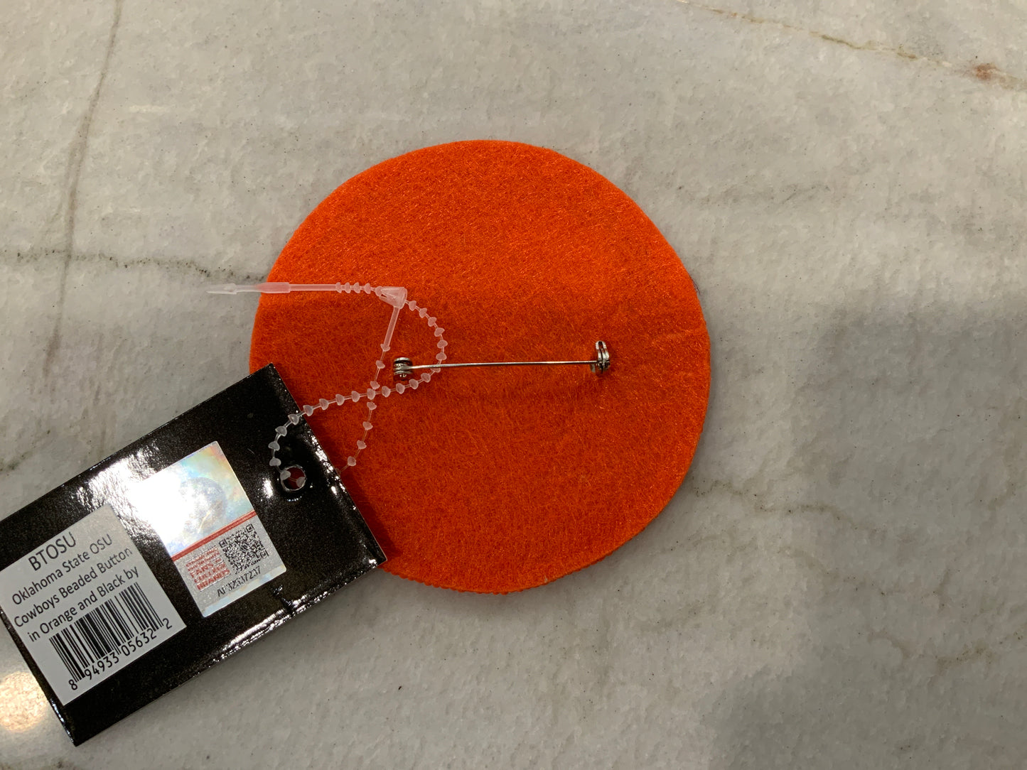 Go Pokes beaded button