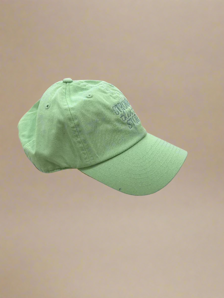 Stronger Than The Storm Green Hat