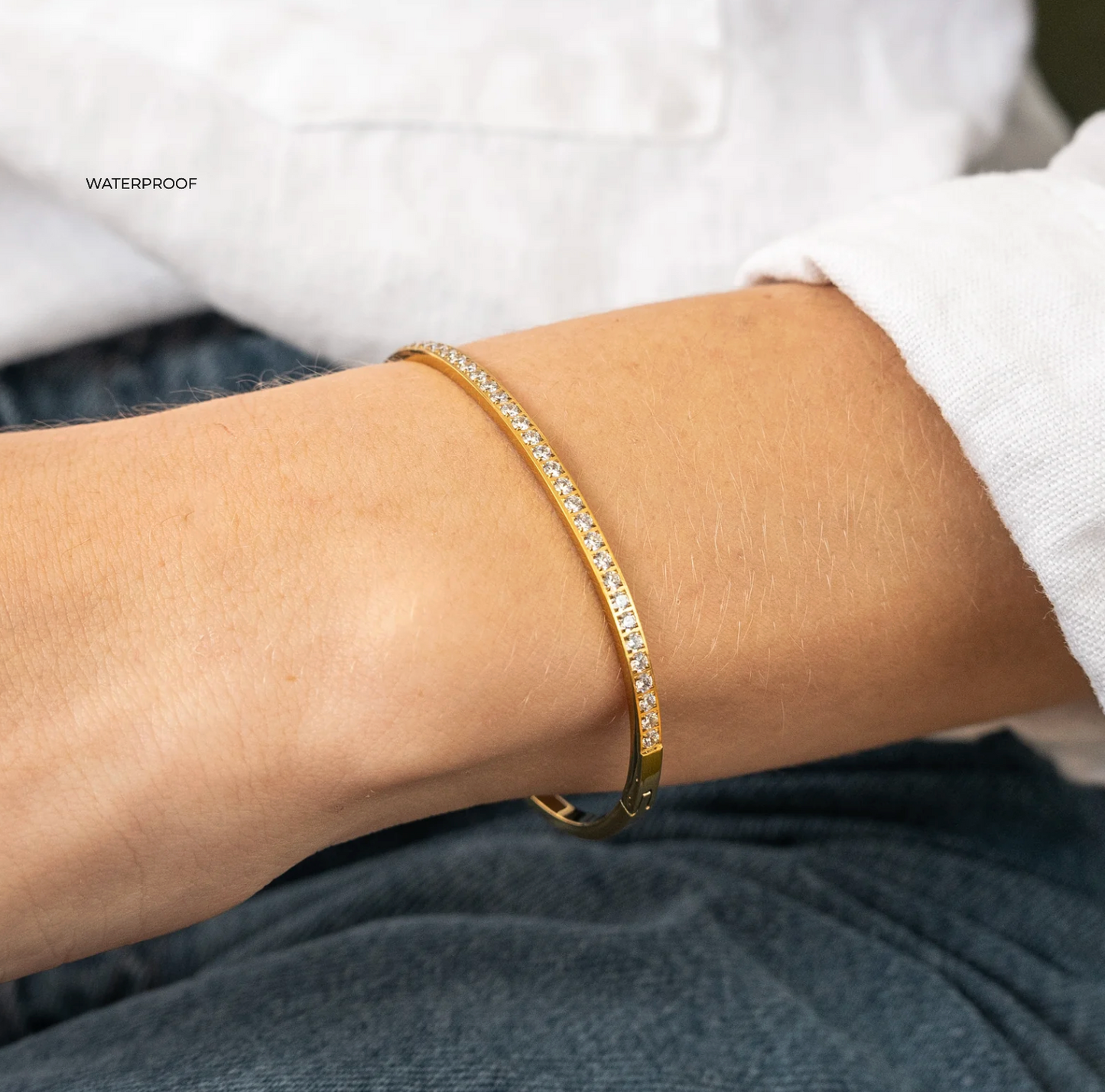 Gold lined diamond bangle bracelet